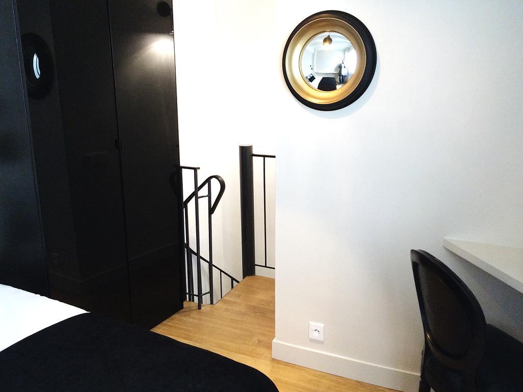 Duplex De Charme Au Coeur De Montmartre Paris Quarto foto